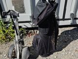 a bag of golf clubs and a bag of golf clubs on the ground