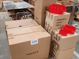many boxes stacked on top of each other in a warehouse
