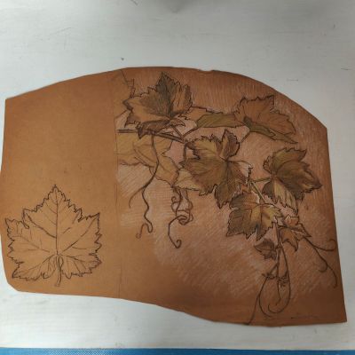 a drawing of a leaf on a piece of paper