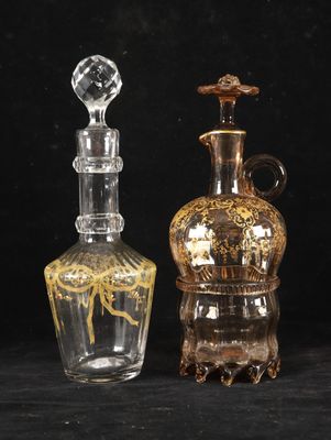 three glass vases sitting next to each other on a black surface