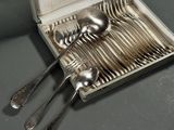 silverware in a box with spoons and spoons in it