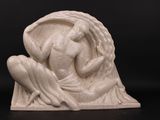 statue of a woman holding a bird in her hands