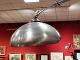 a lamp that is hanging from the ceiling in a room