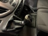 a close up of a car ' s gear lever in a vehicle