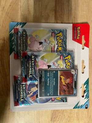 a box of pokemon cards sitting on a table