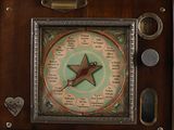 a clock with a star on it on a wall