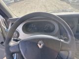 dashboard of a car with a steering wheel and dashboard gauges