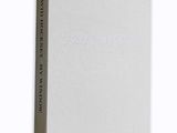 a book with a white cover and black lettering on it