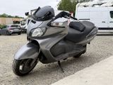 a motorcycle that is parked on the side of the road