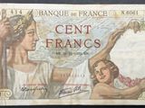 an old french bank note with a woman and child on it