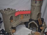 a castle made out of plastic toys on a table