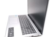 a laptop computer sitting on top of a white table