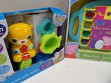two toys that are in the box on the table