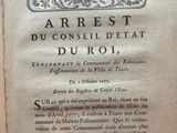 a close up of an old book with writing on it