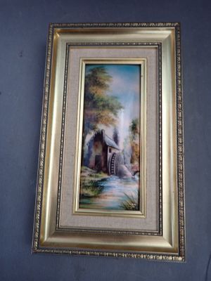 framed picture of a painting of a house in a country setting