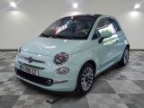 a small car that is sitting on a checkered floor