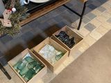 a table that has a lot of glass items on it