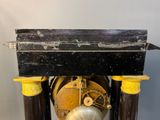a clock that is sitting on a table