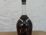 a bottle of liquor that is sitting on a table