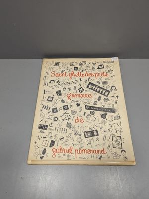 un livre posé sur une table, sur lequel figure un dessin