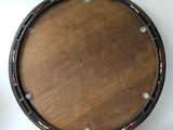 a wooden table with a clock on top of it