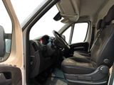 a view of the inside of a van from the driver ' s seat