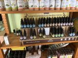 bottles of essential oils are on a shelf in a store