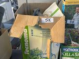 a box of gardening supplies sitting on a table