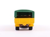 yellow and green toy truck on a white surface with a white background