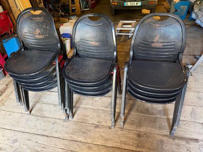 four chairs that are sitting on the floor in the garage