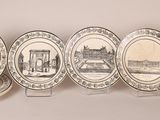 six plates with a picture of a building and a building on them