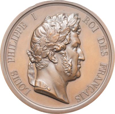 une image représentant une médaille de bronze sur laquelle figure le visage d'un homme