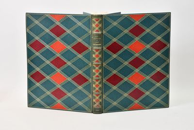 a blue and red plaid book with a red and green cover
