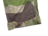 a close up of a camouflage shirt on a white background