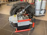 a machine that is sitting on the floor in a room