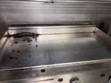 an image of a dirty grill in a kitchen