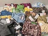a lot of clothes that are in a box
