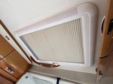 a small air conditioner in the corner of a room