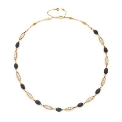 COLLIER retenant une succession de maillons ovales, certains…