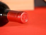 a bottle of wine that is sitting on a table