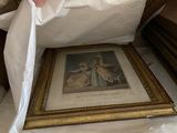 a person that is holding a picture in a bag