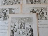 many old books on a table with pictures on them