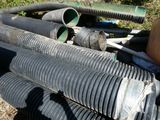a lot of pipes that are laying on the ground