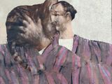a painting of a man kissing a dog on the forehead