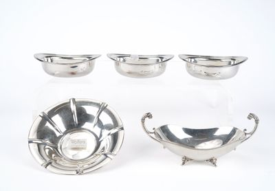four pieces of silverware including a bowl, bowl, and saucer
