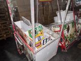 a cart that has a lot of items in it