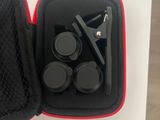 a black and red case with a pair of scissors in it