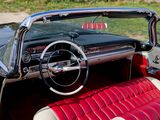 a red and white interior of a classic car