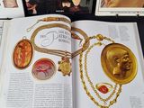 an open book with a picture of a woman ' s face on it