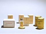 a lot of different types of perfumes on the table